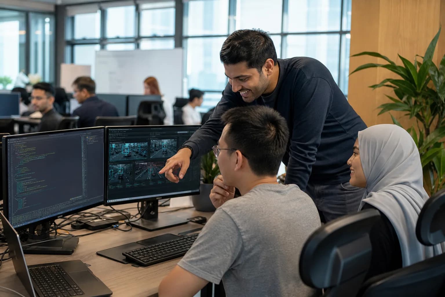 Camnitive engineers pair-programming on the detection pipeline in the Singapore office